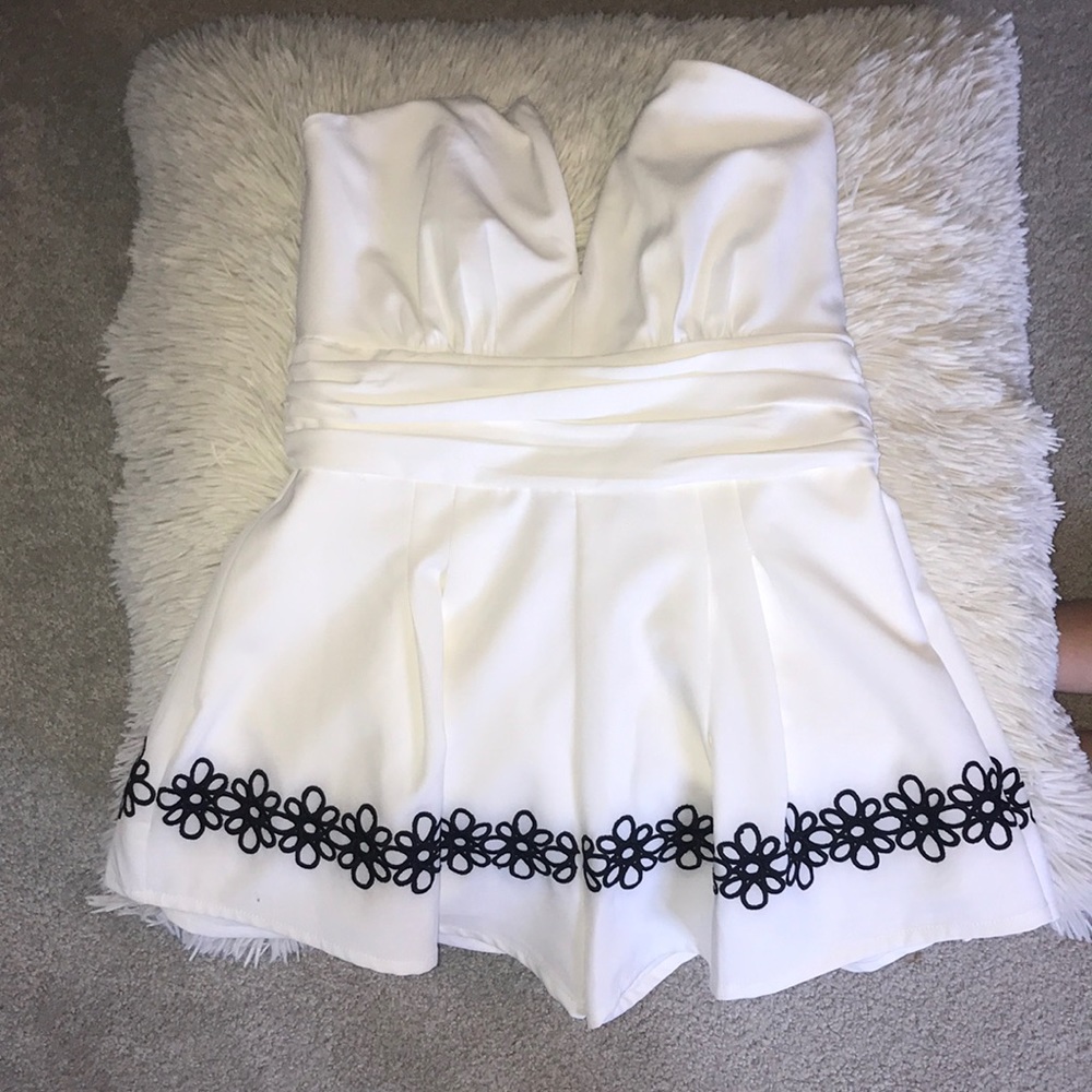 White Romper With Black Detail on bottom